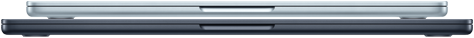 A closed MacBook Air 13-inch in Sky Blue stacked on top of a closed MacBook Air 15-inch in Midnight